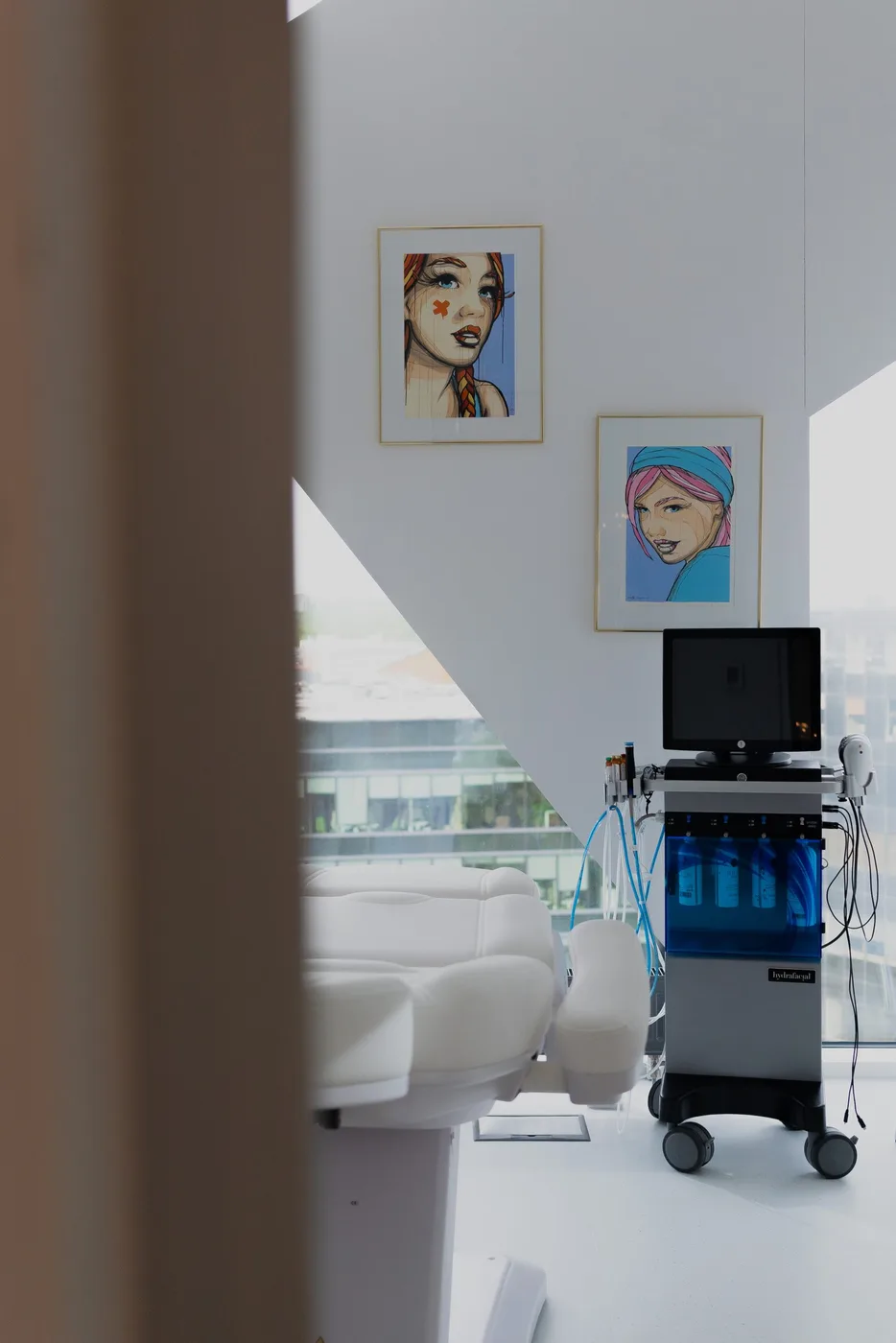 Treatment room at Skin Life Clinic with the Tallinn skyline through the window